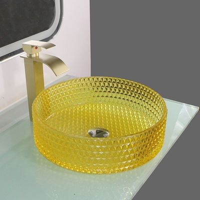 黄色いクリスタル グラスの洗面器の円柱形のカウンタートップの容器の流し